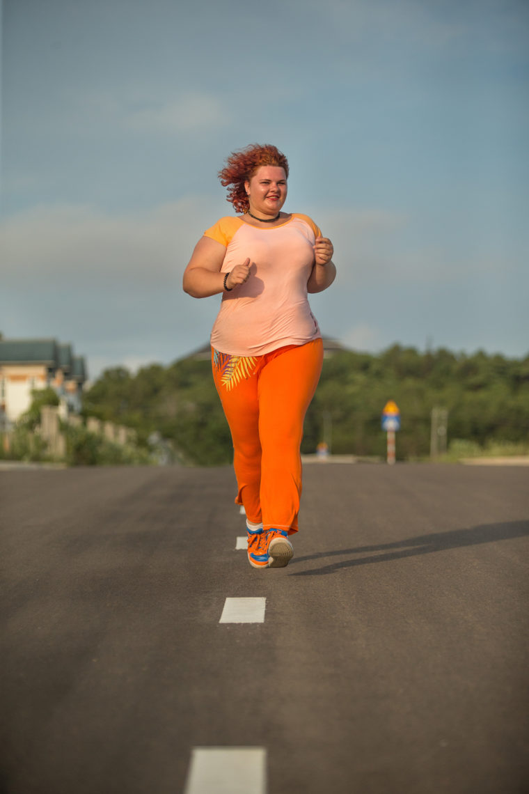Plus size woman running, Healthy lifestyle